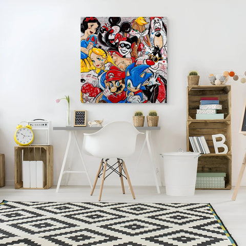 A white desk with a black and white rug and a large painting of cartoon characters