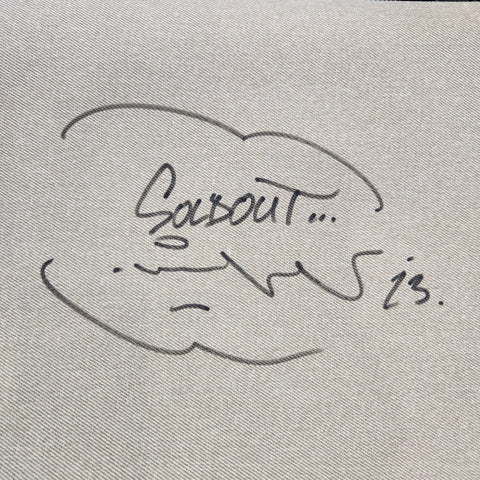 A black and white photo of a handwritten signature
