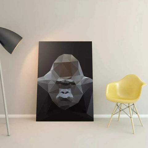 A black and white geometric gorilla face on a black background