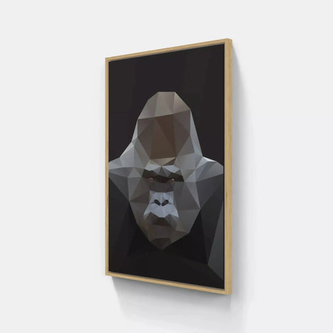 A framed print of a gorilla head on a wall