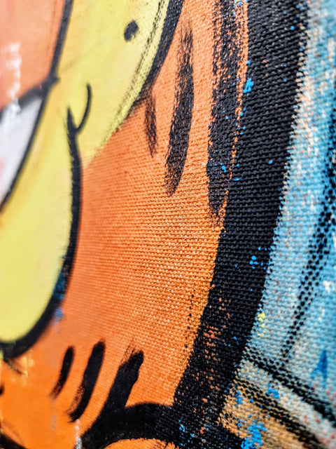 A close up of a painting on a wall