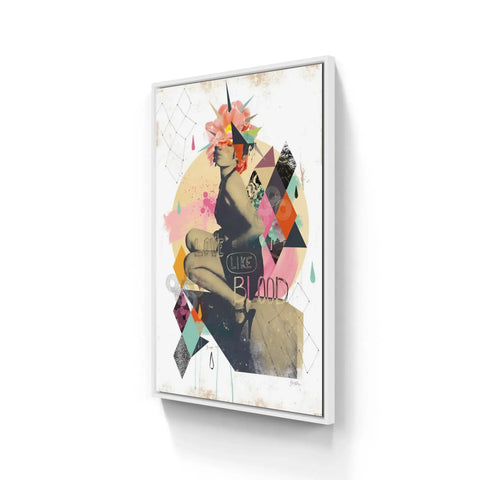A canvas with a woman’s face and colorful geometric shapes
