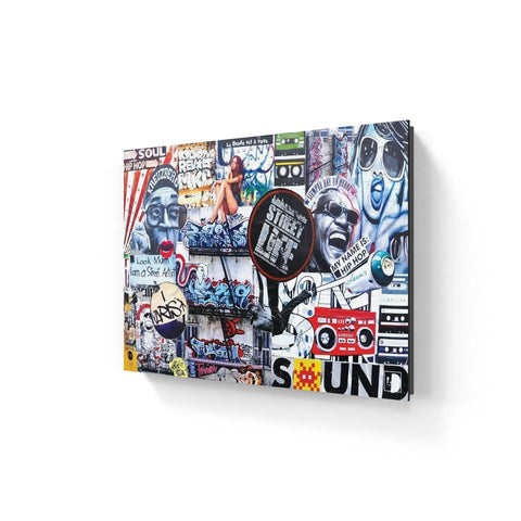 Colorful graffiti and street art collage on a wall featuring various images, text, and symbols related to music and urban culture.