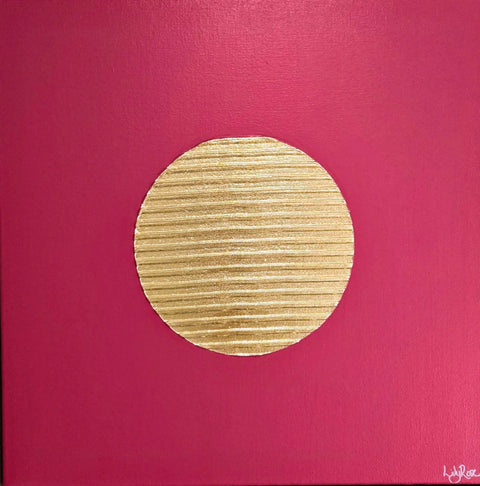 Golden circular disc with horizontal striations on a pink background.
