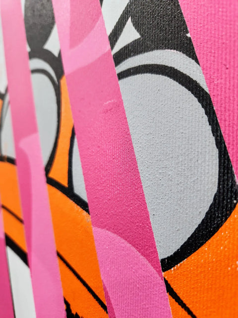 A close up of a pink and orange abstract painting