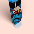 Colorful necktie with a comic book-style graphic design featuring stars and explosive elements.