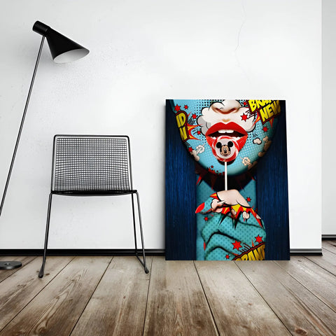 Colorful pop art-style canvas featuring red lips, a skull, and comic book elements.
