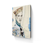 A mixed-media collage portrait of a man wearing a newspaper-topped hat and layered clothing, set against an aged map background.