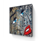 Abstract portrait painting featuring vibrant blue eyes and red lips against a textured gray background.