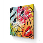 Colorful abstract graffiti-style painting featuring facial features and vibrant splashes of paint.