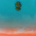 Framed aerial landscape art.
