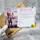 Gray kaws-style egyptian kweam figurine holding ice cream cone with white accents made of original aluminium artwork