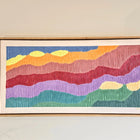 Colorful abstract painting with wavy horizontal stripes in a wooden frame.
