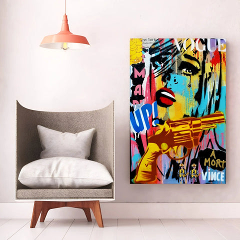 Vibrant pop art-style canvas featuring a graffiti-inspired design with a golden gun and colorful abstract elements.