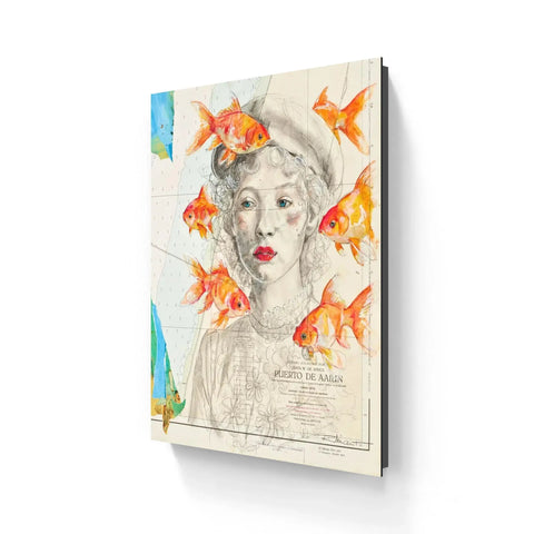 A framed fish eyes limited edition aluminium artwork of a woman with curly hair red lips and orange goldfish on old map background