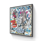 Framed collage artwork featuring a black and white portrait surrounded by colorful text and images.