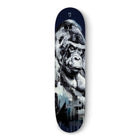 Skateboard deck featuring a striking black and white portrait of a gorilla.