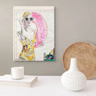A vibrant mixed-media artwork featuring a stylized woman in sunglasses and a yellow patterned swimsuit holding a pink inflatable ring, set against a background resembling architectural blueprint lines.