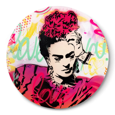 A button with a painting of a woman’s face