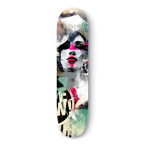 Skateboard deck featuring abstract pop art with bright pink lips and monochromatic spray paint effects.