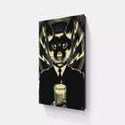 A black cat with green eyes and a suit on a white wall