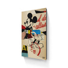 Colorful pop art-style canvas print featuring Mickey Mouse with fragmented text elements.
