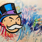 Monopoly man head with colorful graffiti.