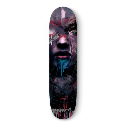 Dark artistic skateboard deck featuring an ethereal portrait design in purple and pink tones.