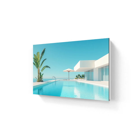 By the pool aluminium wall art featuring a rectangular canvas print of a modern white villa with infinity pool and palm trees