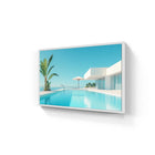 White-framed aluminium wall art featuring a modern infinity pool with turquoise water palm trees and a minimalist white villa