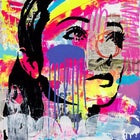 A painting of a woman’s face with a rainbow colored background