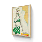 A framed vintage-style poster featuring a woman in a green floral swimsuit with gold sunglasses on a nautical map background in st yves limited edition aluminium frame