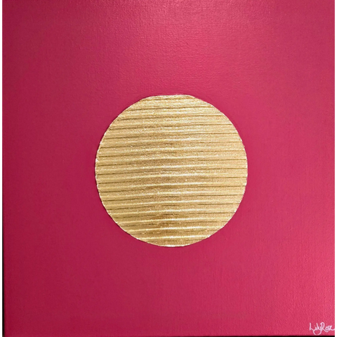 Golden circular disc with horizontal striations on a pink background.