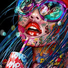 A close up of a woman with a drink and a hat