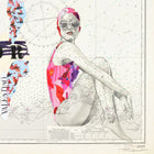 A woman in a vibrant, patchwork swimsuit with pink and purple hues sits against a nautical chart background.