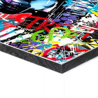 A colorful box with a painting on it