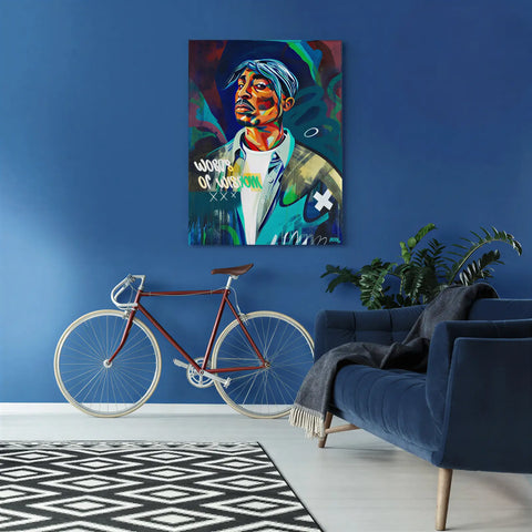 Vibrant pop-art aluminium canvas portrait of Tupac Shakur with colorful brushstrokes and words of wisdom on deep blue wall