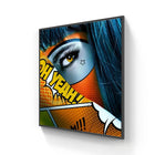 A vibrant limited edition aluminium pop art canvas featuring a stylized eye with bold black lashes and golden iris framed in dark gray